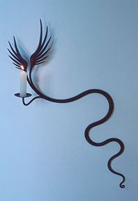 Winged candle holder
