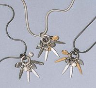 Three 'mixed pod cluster' necklaces