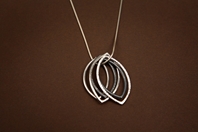 Leaf pendants looped through chain