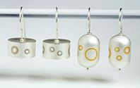 Hanging earrings in silver and 22ct gold or 18ct white gold.
