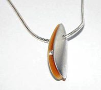 Trap pendant - medium silver shell with 3pt diamond.