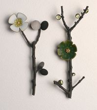 ikebana brooches with white and green enamel
