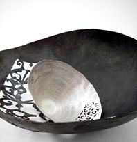 pierced silver bowl and pierced copper bowl