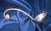 Silver ladle.