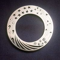 Plaid brooch with pierced decoration.