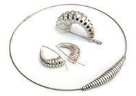 Spiral ‘windsock’ brooch & earrings and fine spiral pendant, silver, 2004.