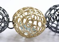 Detail, multiple sphere necklace.