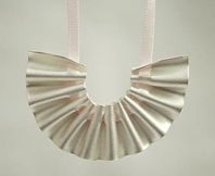 Fine silver pendant & ribbons.