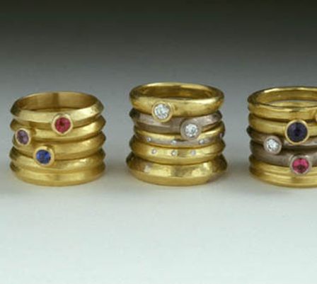 wedding and engagement rings 18ct yellow and white gold with rubies, sapphires and diamonds