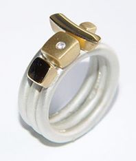 Silver ring with 18ct gold detail & diamond.