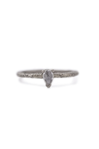White gold ring with rose cut pear shaped white diamond